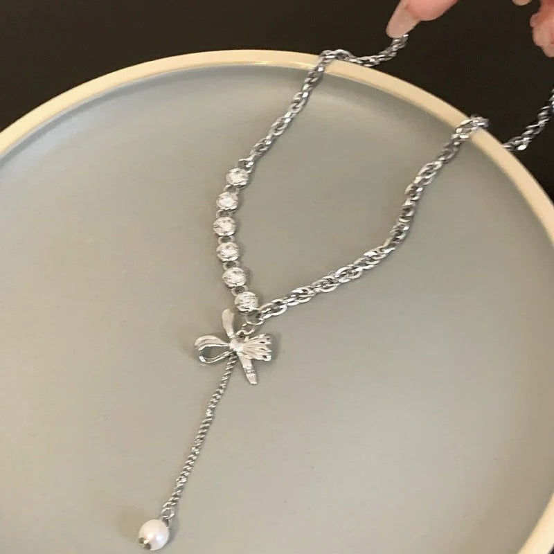 Titanium Bow Pendant Necklace