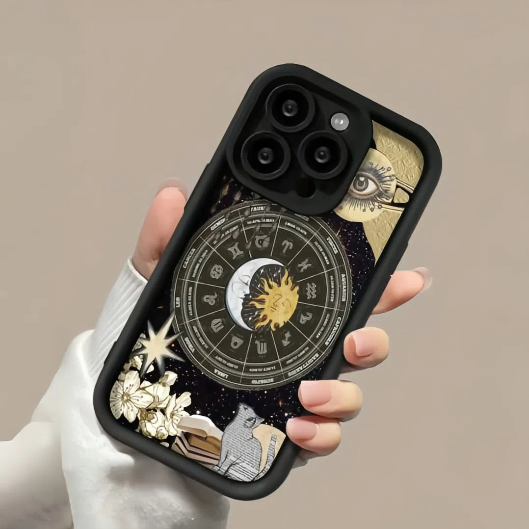 Hand holding phone with zodiac astrology case, moon and sun, stars, flowers, cat design