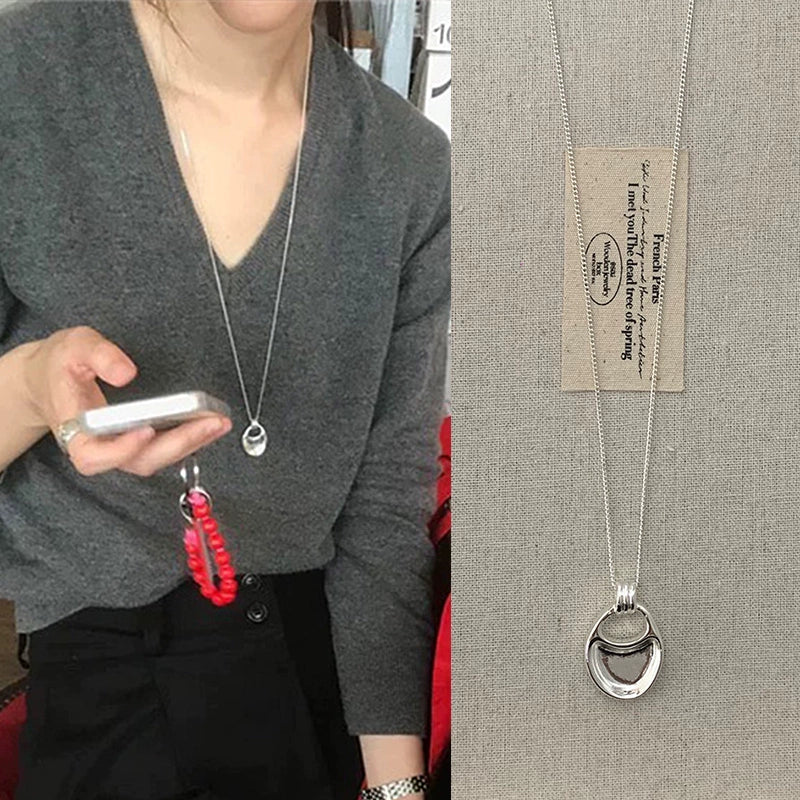 Silver Saddle Bag Pendant Necklace