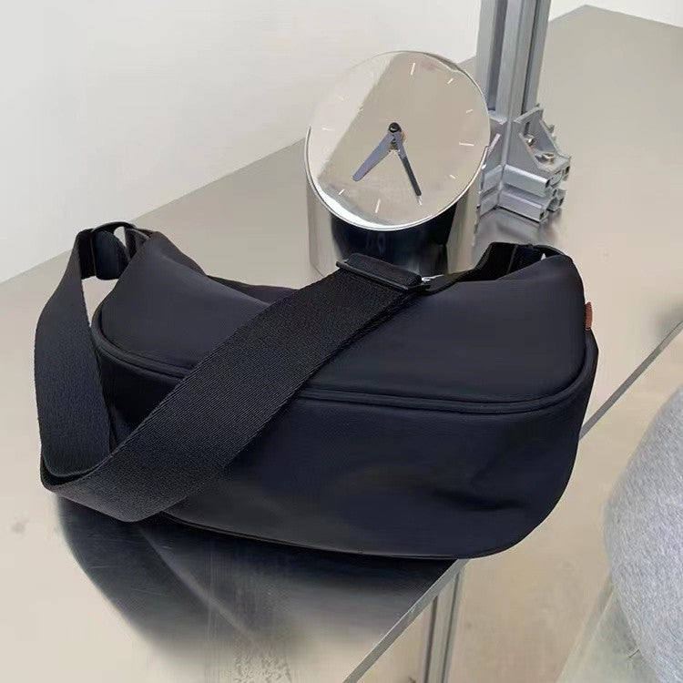 Crescent Sling Duffel Bag