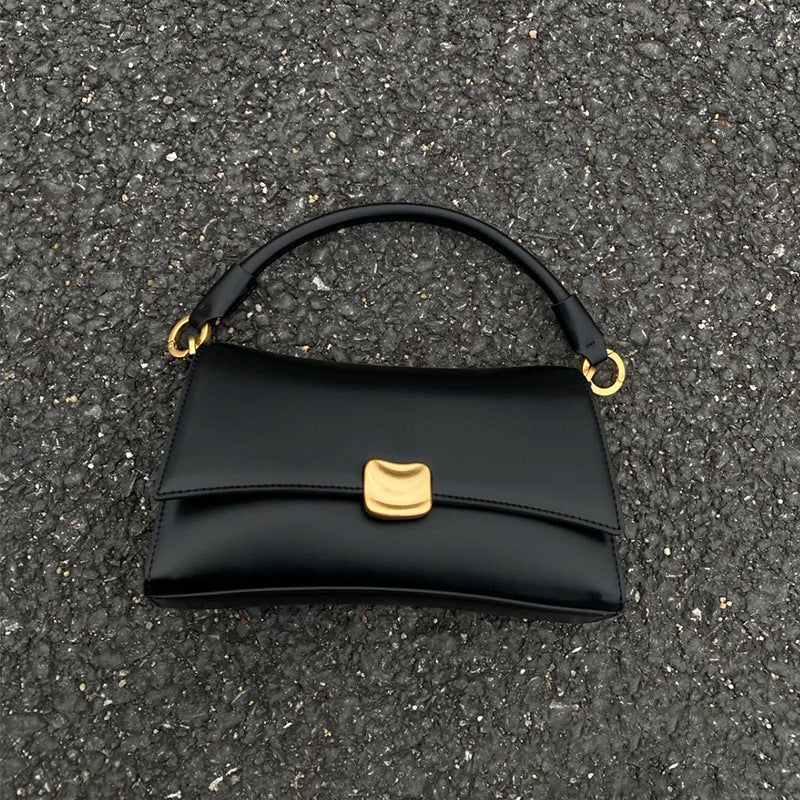 Sculptural Clasp Baguette Bag