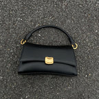 Sculptural Clasp Baguette Bag