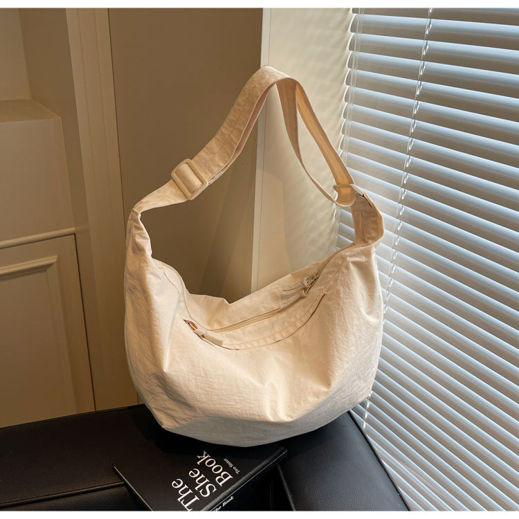 Crescent Dumpling Sling Bag