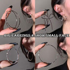 Bow Stud Earrings Statement