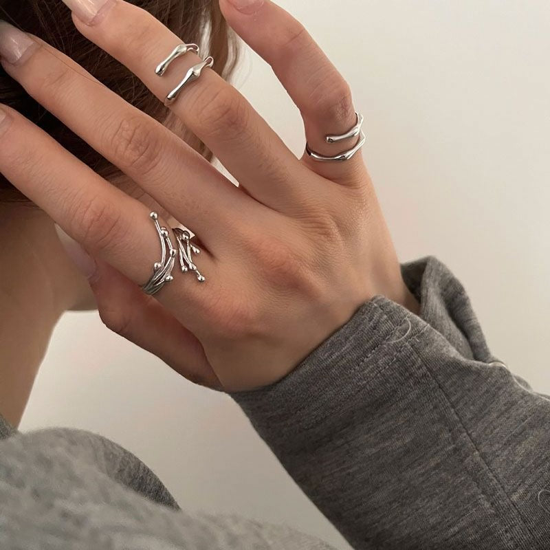 Minimal Flowing Spark Ring