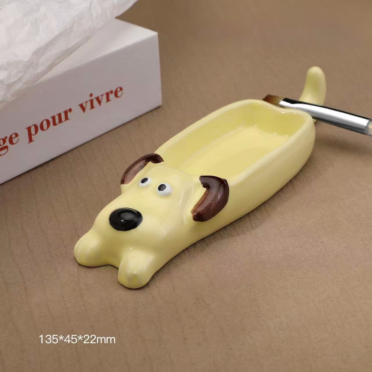 Long puppy ceramic dipping dish, yellow dog lying flat