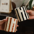 Striped Handleless Ceramic Cup